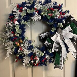 Elegant Blue and White Holiday Wreath with Red Accents